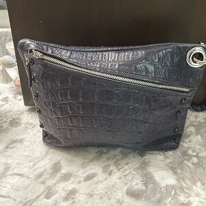 Woman’s leather clutch
